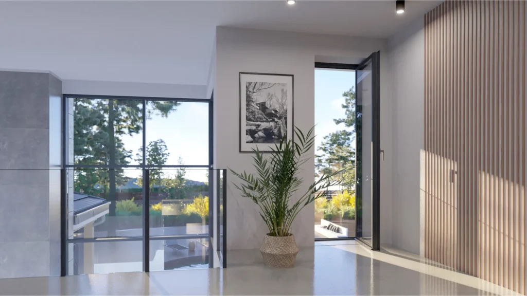 Domovská stránka Moderní prosvětlený interiér s prosklenou stěnou a hliníkovými dveřmi ukazující využití komponentů Aluron SYLUNYX.